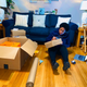 Ajón Crump personally addresses a box ready for shipping.